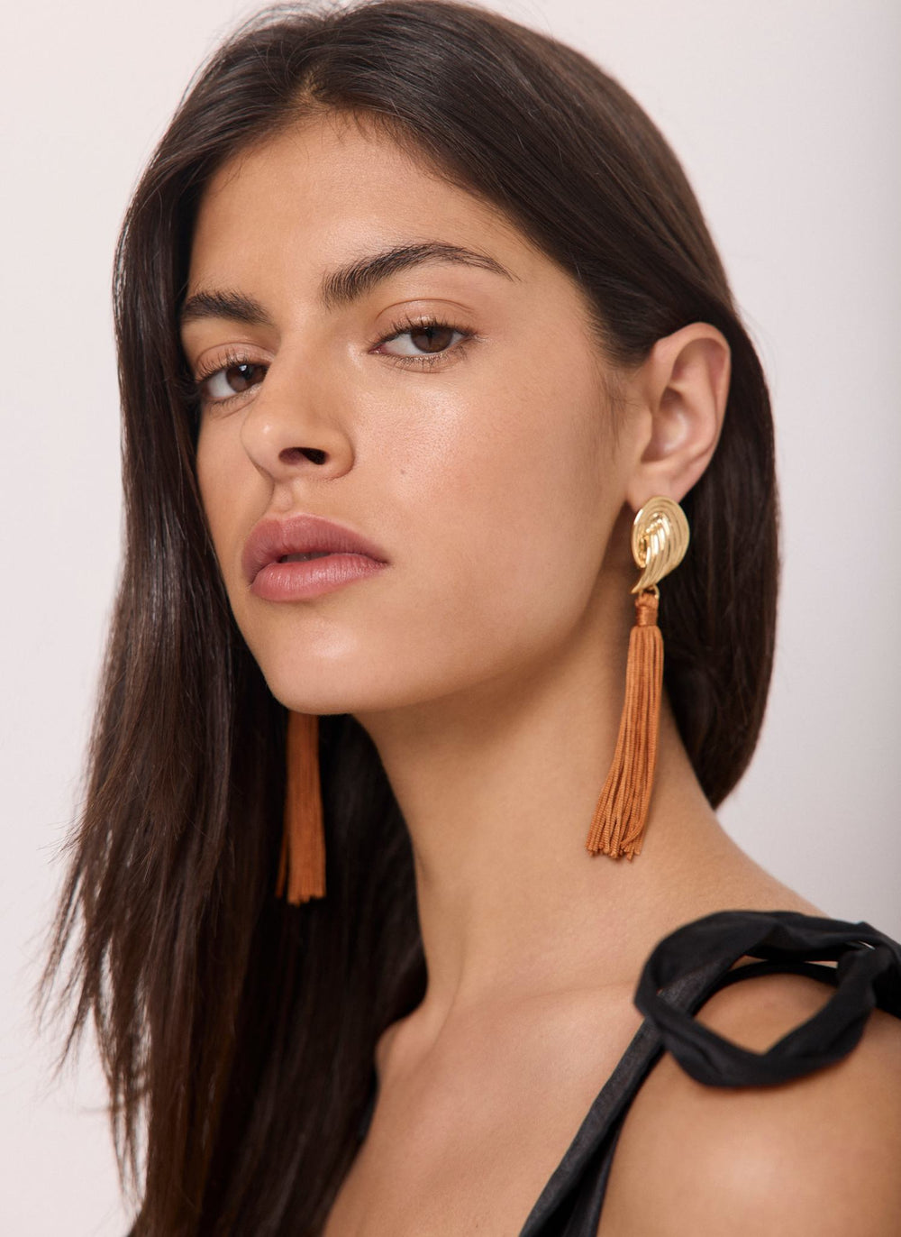 Gold Tone Ridged Wing Tassel Earrings