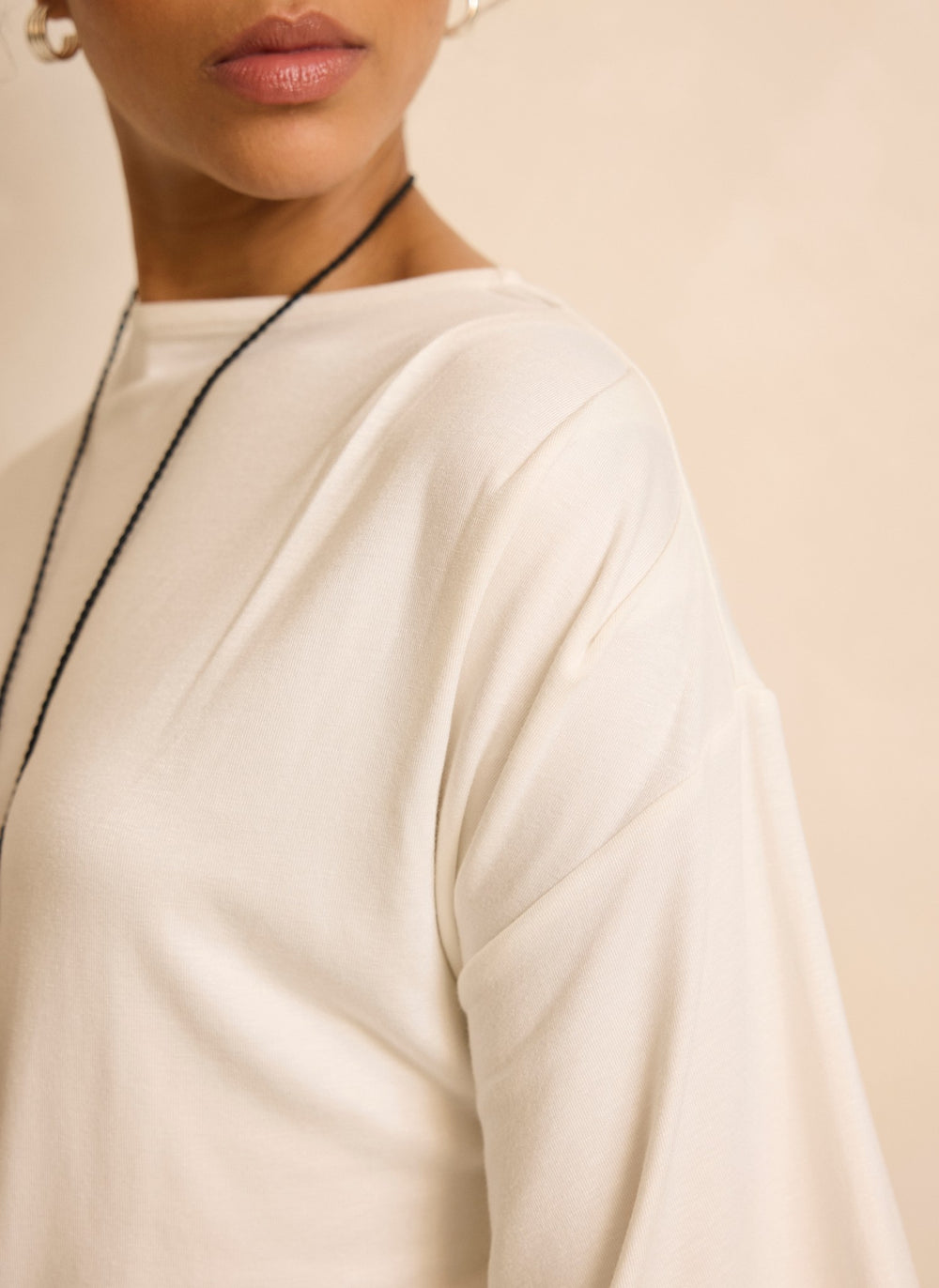 Cream Draped Asymmetric Top