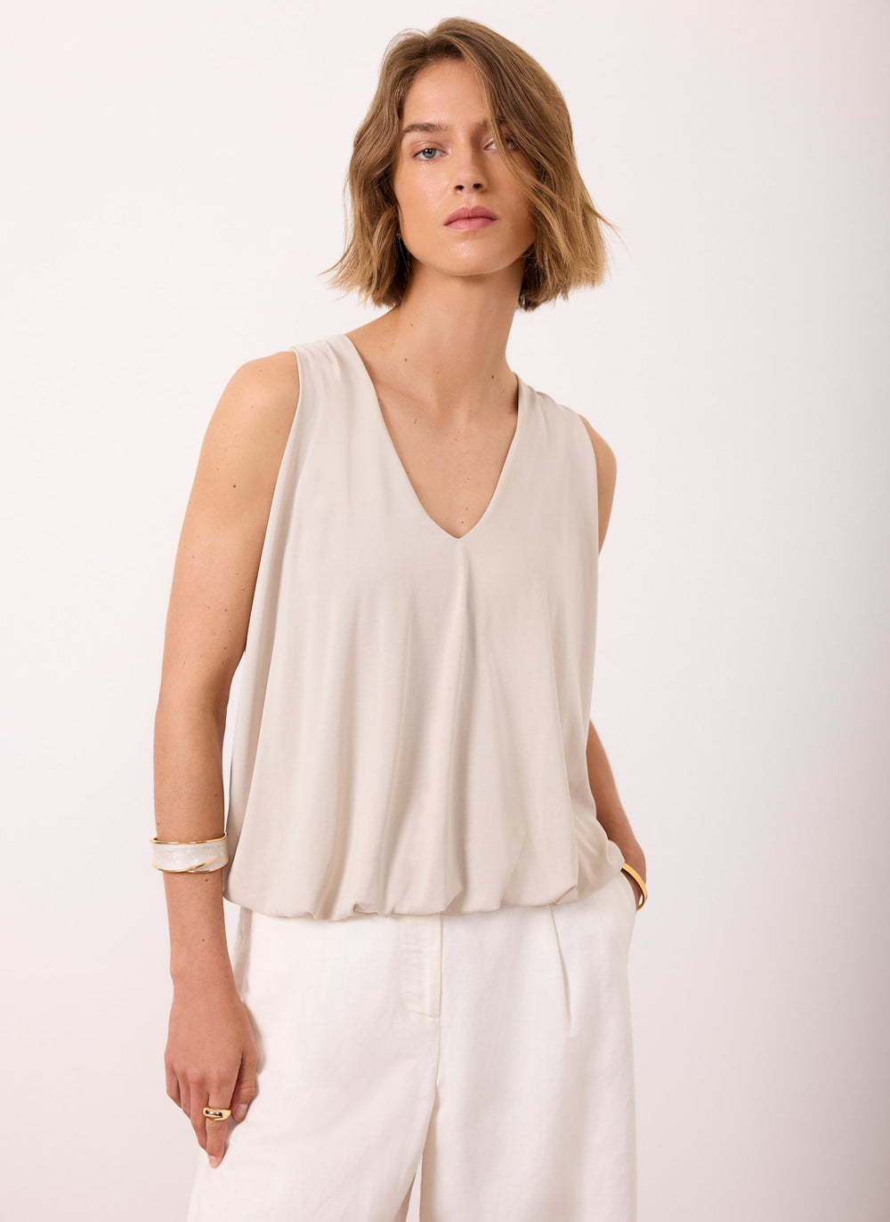 Neutral V Neck Bubble Hem Top