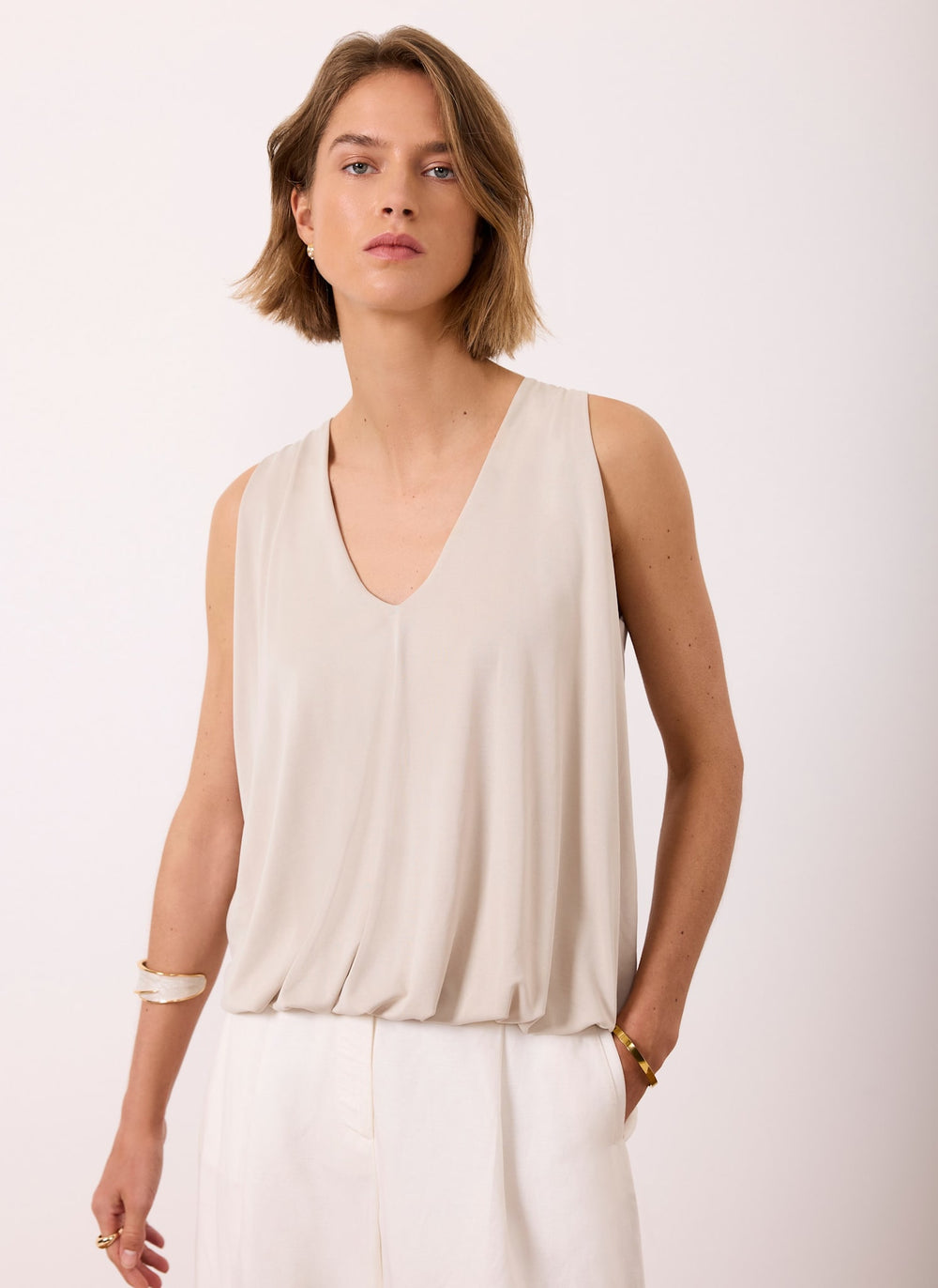 Neutral V Neck Bubble Hem Top