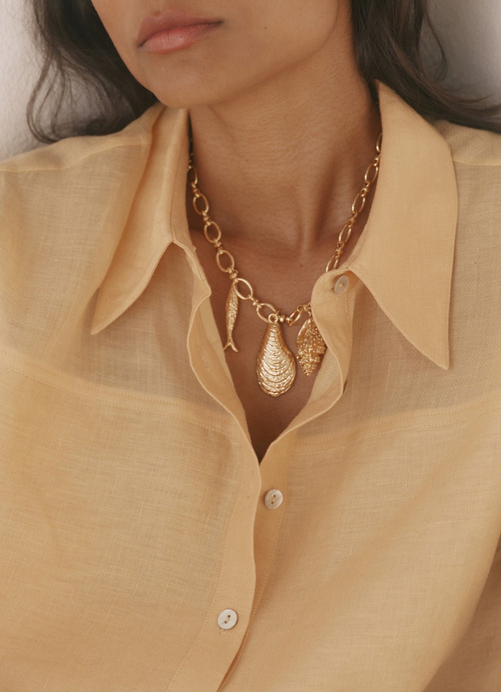Gold Tone Shell Statement Charm Necklace