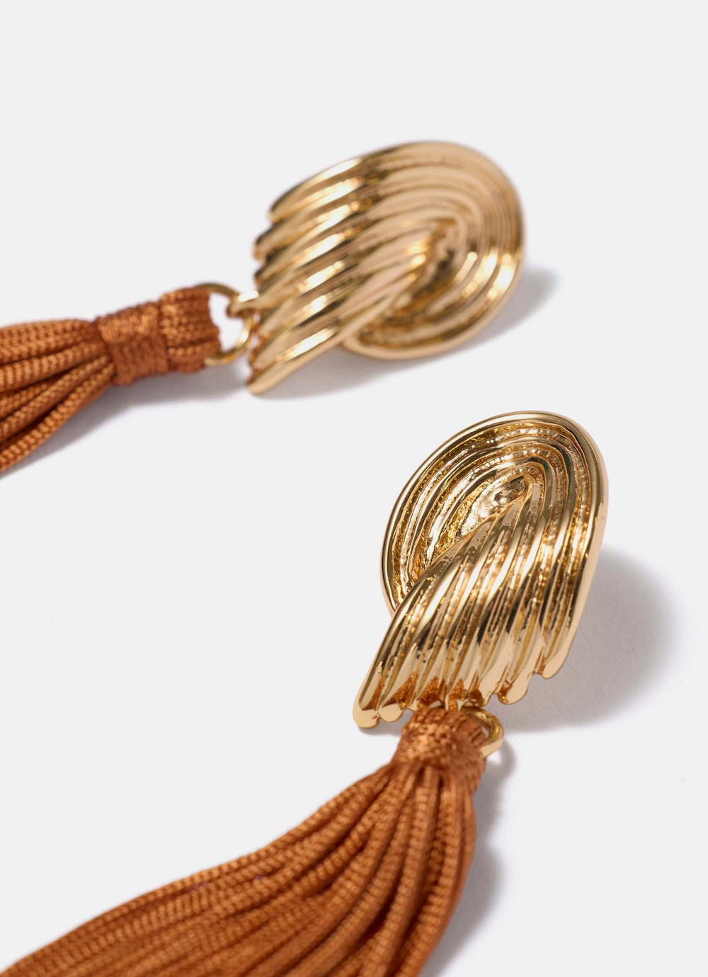 Gold Tone Ridged Wing Tassel Earrings