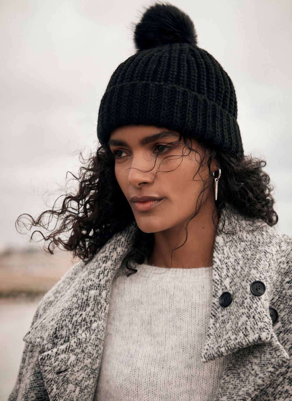 Black Faux Fur Pom Pom Beanie Hat – Mint Velvet