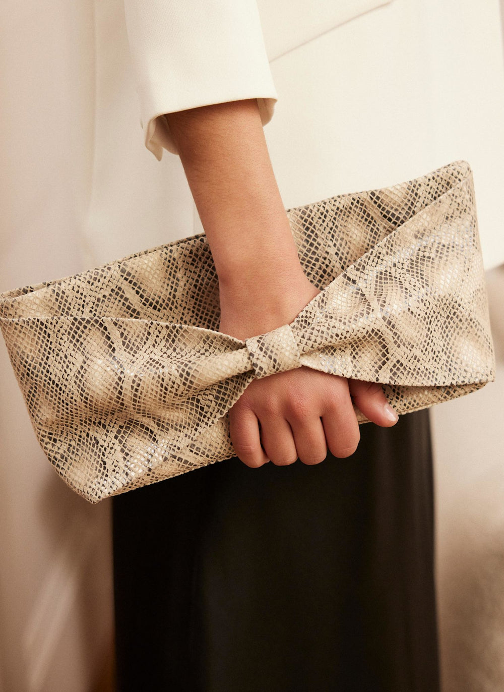 Cream Snake Print Leather Clutch Bag