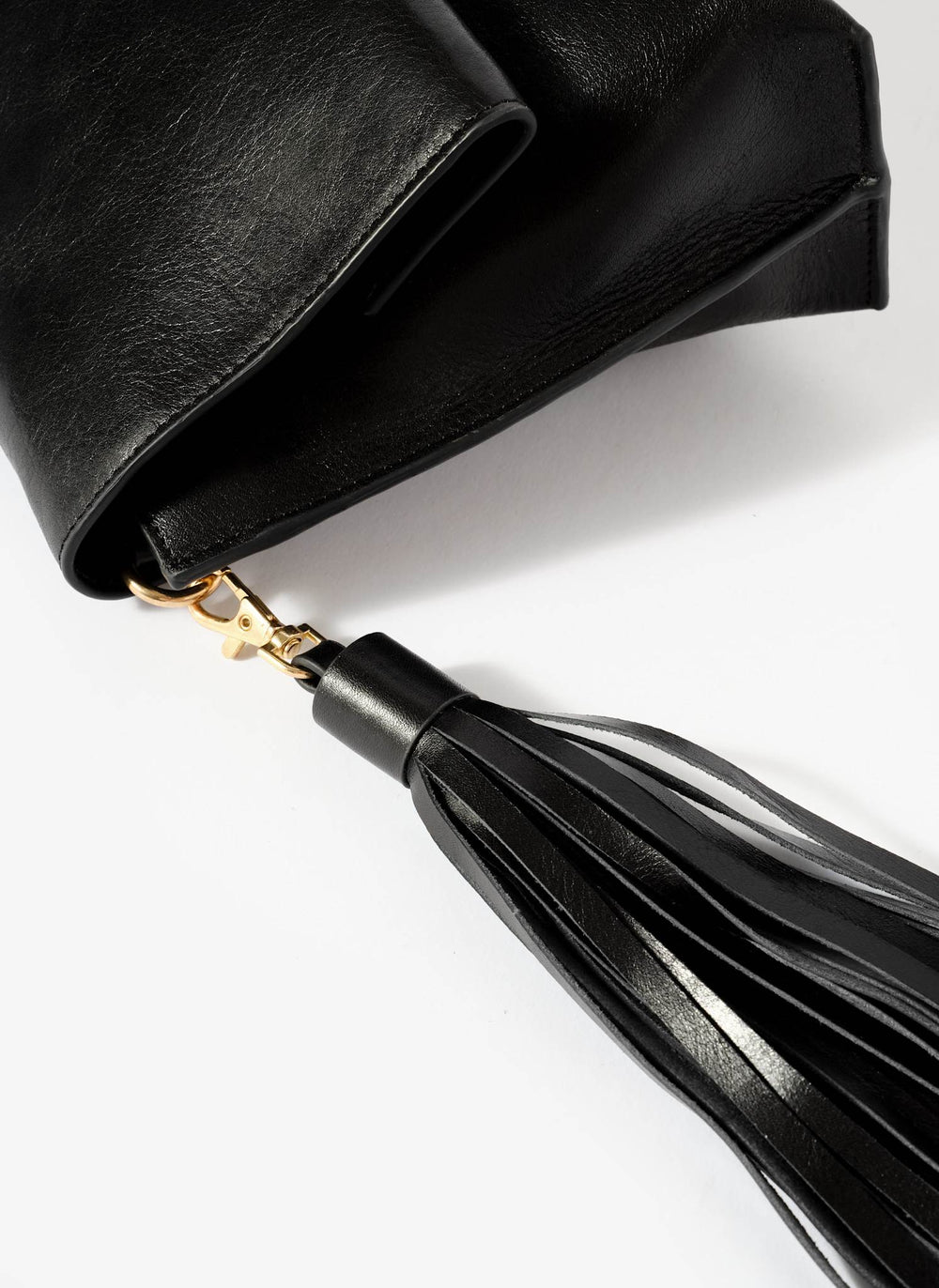Daisy Black Leather Fold Over Tassel Clutch