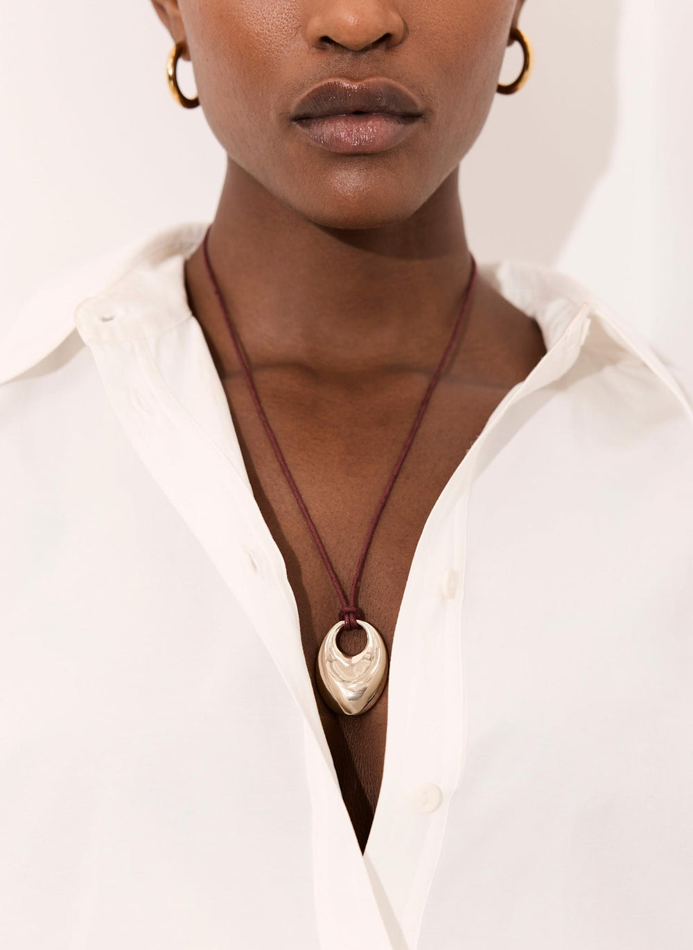 Gold Tone Rope Pendant Necklace