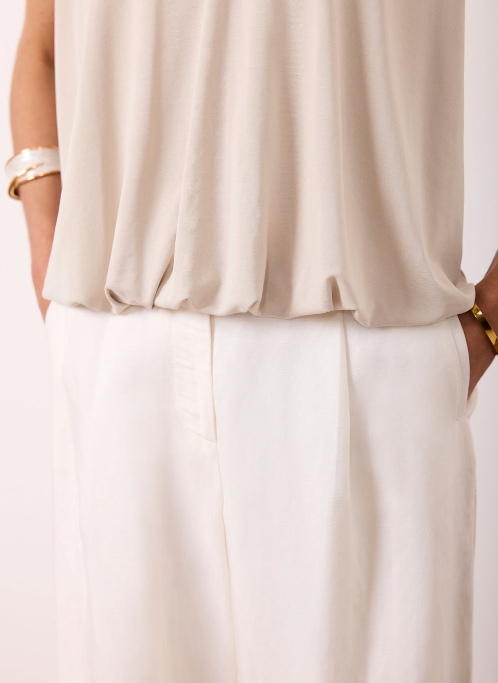 Neutral V Neck Bubble Hem Top