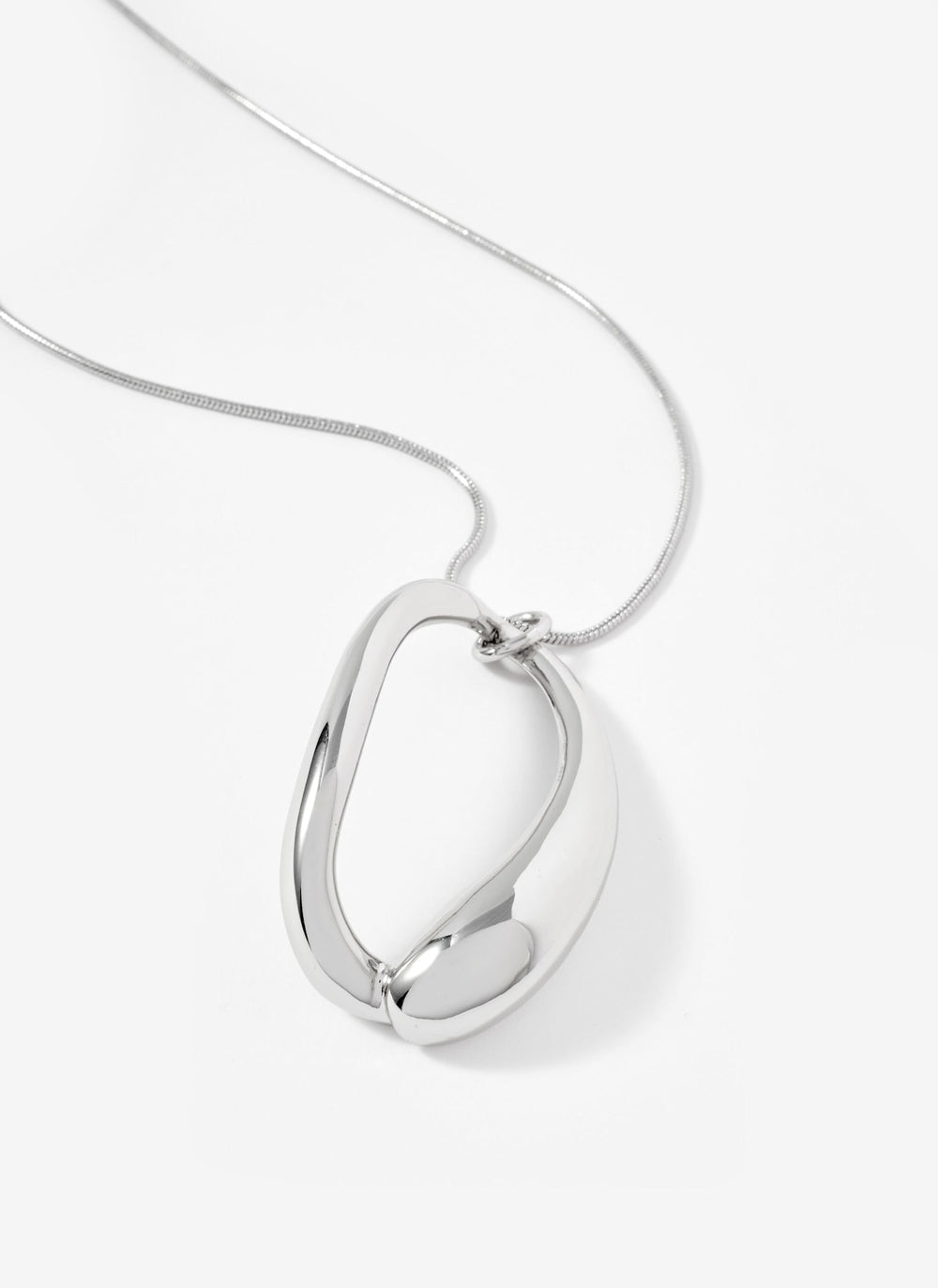 Silver Tone Sculpted Long Pendant